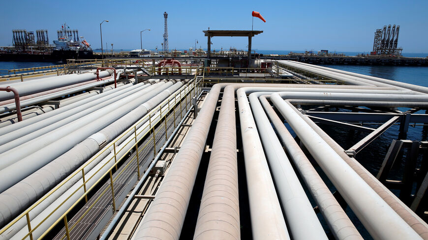An oil tanker is being loaded at Saudi Aramco's Ras Tanura oil refinery and oil terminal in Saudi Arabia May 21, 2018. Picture taken May 21, 2018. REUTERS/Ahmed Jadallah