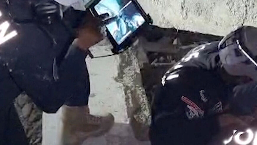 A Jordanian team works to rescue a child trapped under rubble following earthquakes in Venezuela, in a location given as Caracas, Venezuela, in this still image obtained from a handout video released on June 30, 2026. Two deadly back-to-back 7.2- and 7.5-magnitude quakes occurred in Venezuela on June 24, 2026. Jordan Public Security/Handout via REUTERS