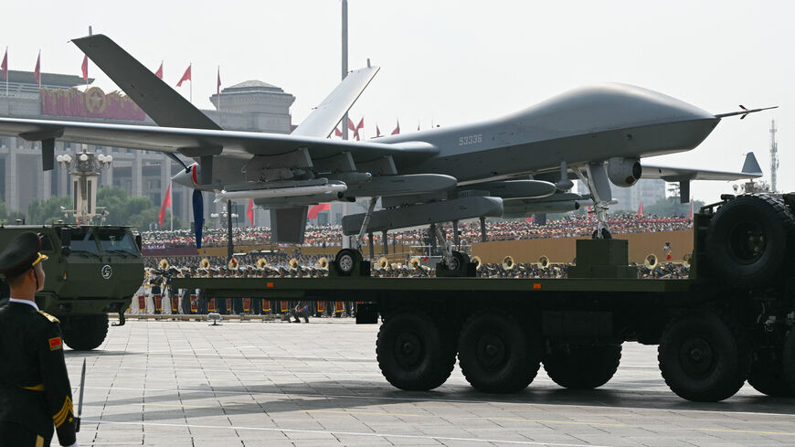 An unmanned aerial vehicle is seen during a military parade marking the 80th anniversary of victory over Japan and the end of World War II, in Beijing's Tiananmen Square on September 3, 2025. (Photo by GREG BAKER / AFP) (Photo by GREG BAKER/AFP via Getty Images)