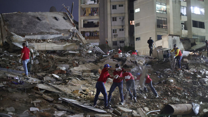 Responders arrive to a demolished building at San Bernardino after a magnitude 7.2 earthquake struck Venezuela and other regions in the Caribbean on June 24, 2026 in Caracas, Venezuela.