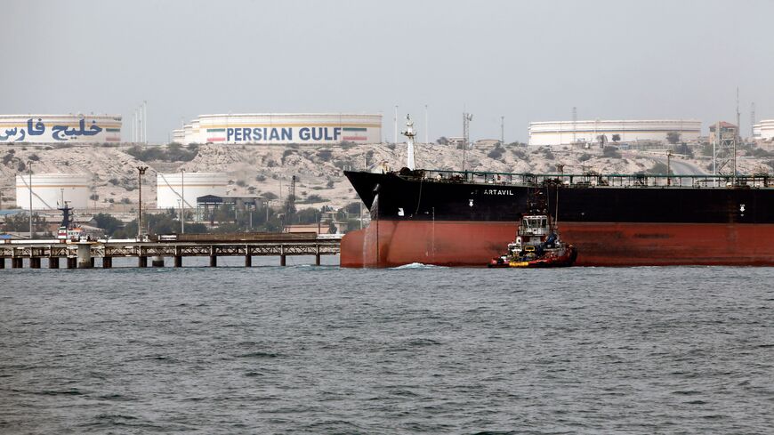 A picture taken on March 12, 2017, shows an Iranian tanker docking at the platform of the oil facility in the Kharg Island, on the shore of the Gulf.