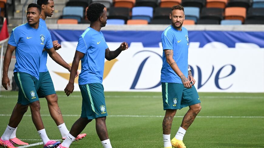Brazil's Vinicius Junior (C) and Neymar take part in a World Cup training session in Houston