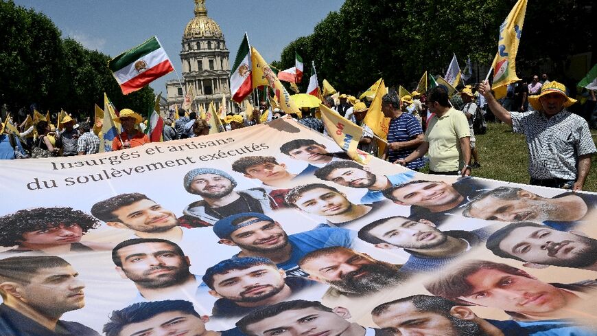 Hundreds of protesters gathered in central Paris to denounce repression and executions in Iran