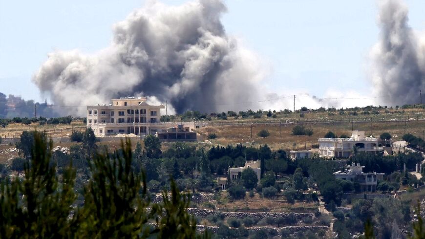 Smoke rises from an Israeli bombardment near the village of Kfar Tibnit in southern Lebanon 