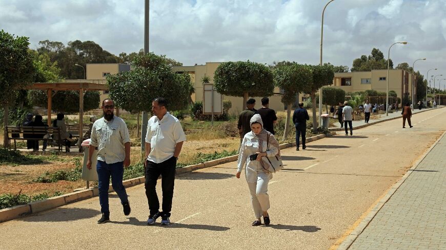 People on campus at the University of Benghazi, which was largely reduced to ruins a decade ago