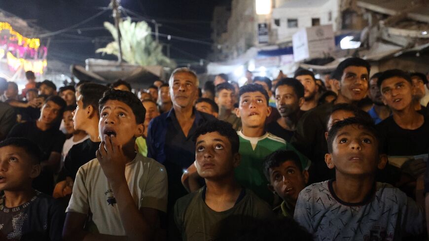 Palestinian football fans gathered to watch the World Cup Group on a giant screen