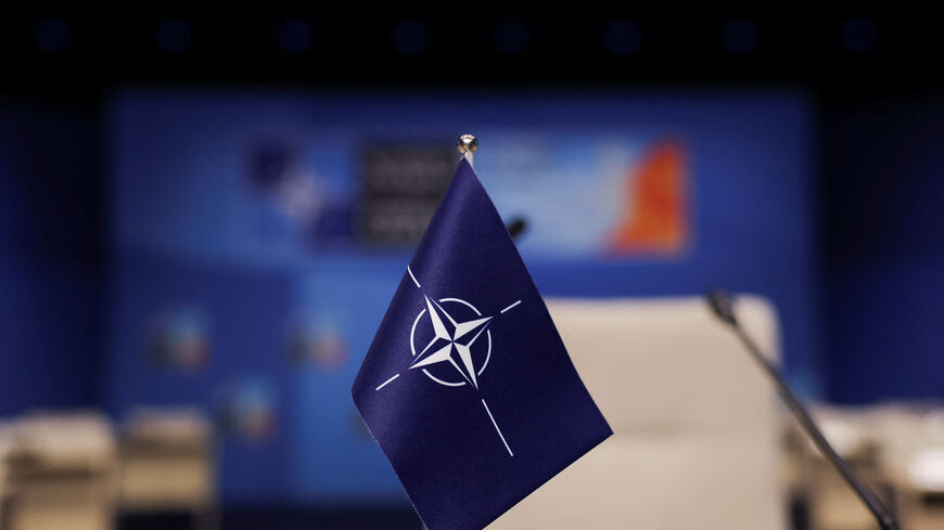 The NATO flag is pictured at the venue of the upcoming NATO summit, in The Hague, Netherlands June 23, 2025. REUTERS/Christian Hartmann