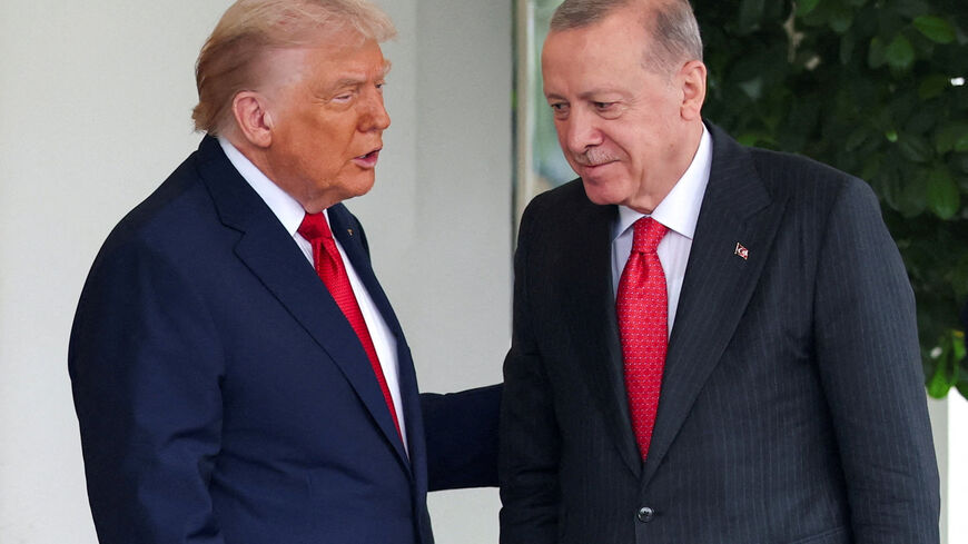 FILE PHOTO: U.S. President Donald Trump welcomes Turkey's President Recep Tayyip Erdogan at the White House in Washington, D.C., U.S., September 25, 2025. REUTERS/Jonathan Ernst/File Photo