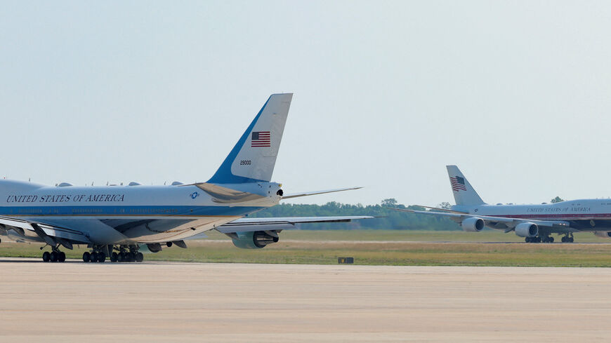 The new Air Force One, a plane gifted by the Qatari government, taxis near the old Air Force One at Joint Base Andrews, Maryland, U.S., July 1, 2026. REUTERS/Kylie Cooper