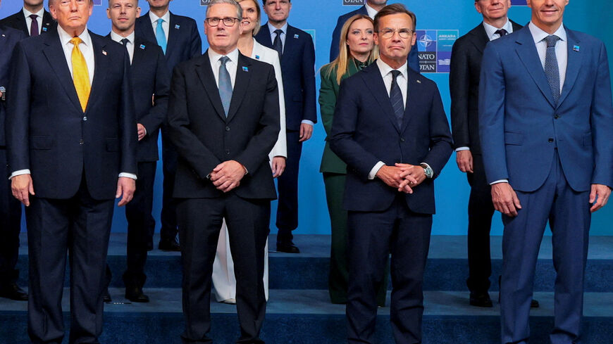 FILE PHOTO: U.S. President Donald Trump poses for a family photo, joined by British Prime Minister Keir Starmer, Sweden's Prime Minister Ulf Kristersson, Spanish Prime Minister Pedro Sanchez and other leaders during the NATO leaders summit at the Bestepe Presidential Compound in Ankara, Turkey, July 8, 2026. REUTERS/Jonathan Ernst/File Photo
