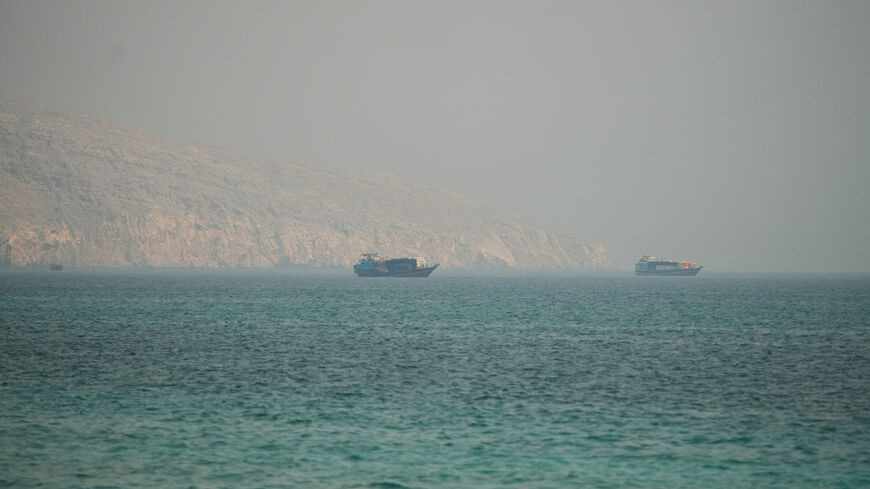 FILE PHOTO: Vessels at the Strait of Hormuz, as seen from Musandam, Oman, July 9, 2026. REUTERS/Stringer/File Photo