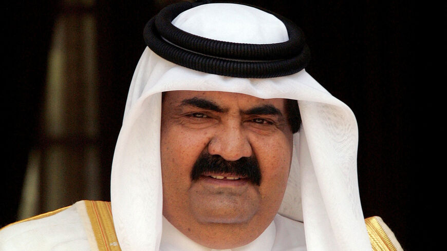 FILE PHOTO: The emir of Qatar, Sheikh Hamad bin Khalifa al-Thani, looks on before his meeting with Indian Prime Minster Manmohan Singh (not in picture) in New Delhi, India April 14, 2005. REUTERS/B Mathur/File Photo