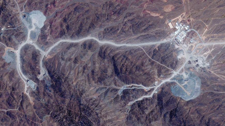 FILE PHOTO: A satellite view shows tunnel entrances at Pickaxe Mountain, of the Natanz nuclear facility, near Natanz, Iran, June 30, 2026. Vantor/Handout via REUTERS/File Photo