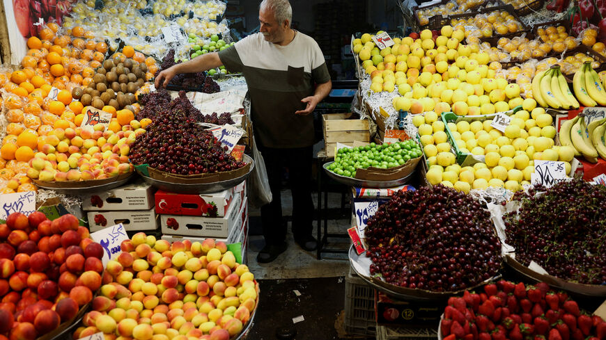 FILE PHOTO: A man works at his store in a local market in Tehran, Iran, June 11, 2026. Majid Asgaripour/WANA (West Asia News Agency) via REUTERS/File Photo