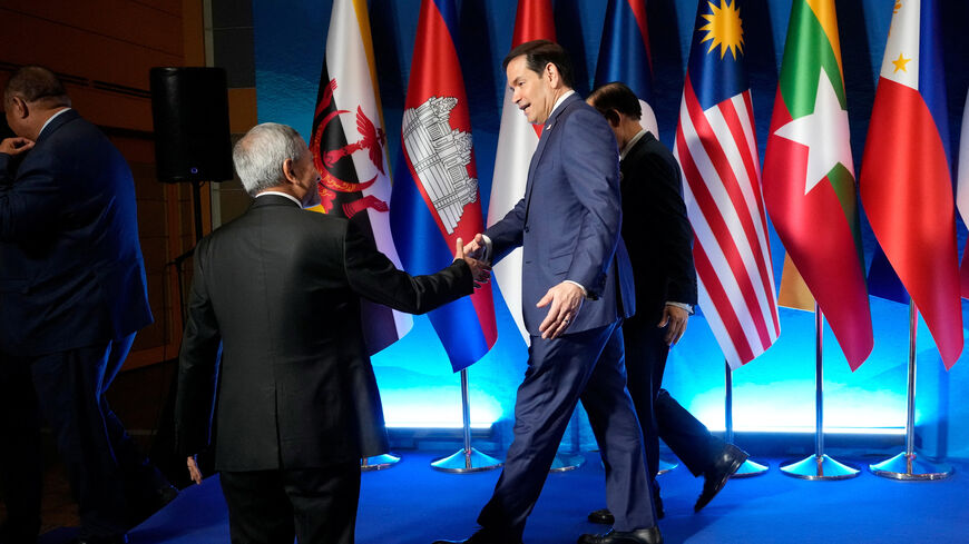 Singapore's Foreign Minister Vivian Balakrishnan shakes hands with U.S. Secretary of State Marco Rubio after a group photo session during the ASEAN Post Ministerial Conference with the United States on the sidelines of the Association of Southeast Asian Nations (ASEAN) Foreign Ministers' Meeting in Pasay City, Metro Manila, Philippines, July 22, 2026. Aaron Favila/Pool via REUTERS