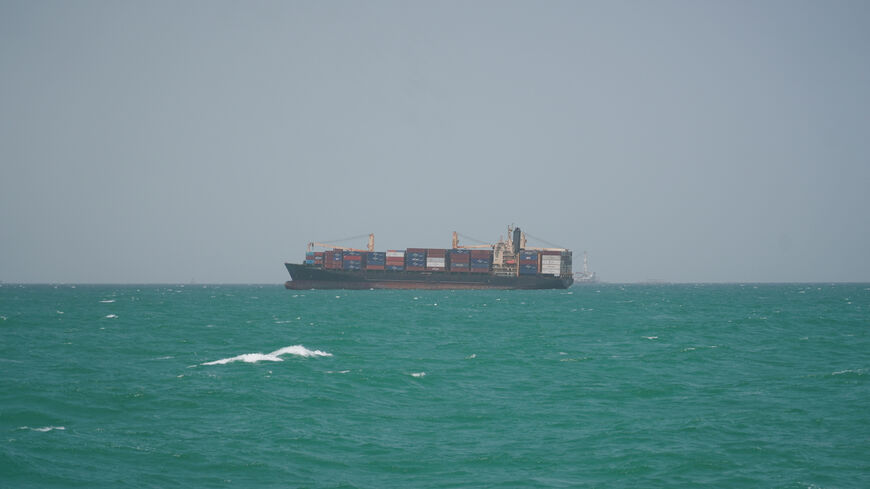 FILE PHOTO: A cargo ship sails in Saudi waters near the Dammam Port in Dammam, Saudi Arabia, May 17, 2026. REUTERS/Mohammed Benmansour/File Photo