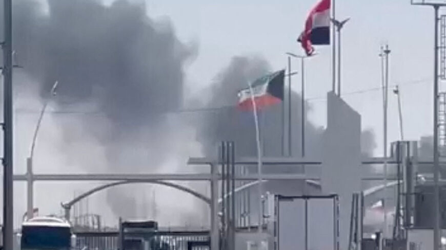 Smoke rises at the Abdali border crossing with Iraq, as it was subjected to a drone attack according to the Kuwait army, as seen from the Iraqi side in Safwan, Basra Governorate, Iraq July 23, 2026, in this screen grab obtained from a social media video. Social Media/via REUTERS