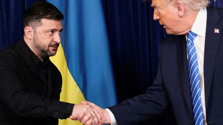 FILE PHOTO: U.S. President Donald Trump and Ukrainian President Volodymyr Zelenskiy shake hands during a press conference after their lunch meeting at Trump?s Mar-a-Lago club, in Palm Beach, Florida, U.S., December 28, 2025. REUTERS/Jonathan Ernst/File Photo