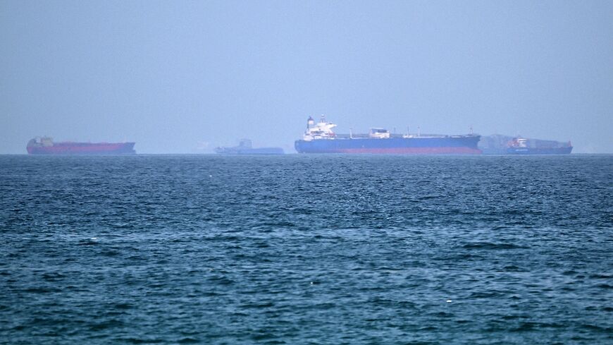Vessels are pictured off the coast of the Khor Fakkan Container Terminal, a major UAE container port near Oman, in the same region where three tankers were struck