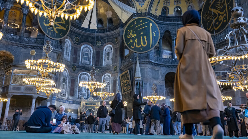 Visitors stand inside Hagia Sophia Grand Mosque in Istanbul on April 14, 2025.