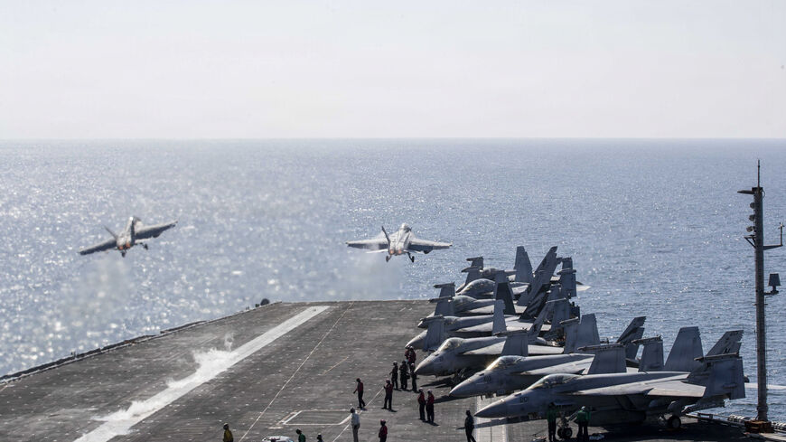 In this handout photo provided by the US Navy, Two F/A-18 Super Hornets launch from the flight deck of Nimitz-class aircraft carrier USS Abraham Lincoln (CVN 72) in support of Operation Epic Fury on March 3, 2026 in the Mediterranean Sea. 