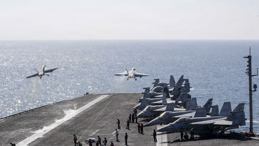 In this handout photo provided by the US Navy, Two F/A-18 Super Hornets launch from the flight deck of Nimitz-class aircraft carrier USS Abraham Lincoln (CVN 72) in support of Operation Epic Fury on March 3, 2026 in the Mediterranean Sea. 