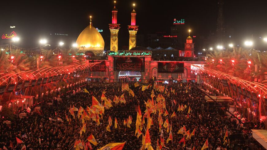 Mourners take part in the funeral procession of Iran's late supreme leader, Ayatollah Ali Khamenei, at Imam Hussein Shrine in Karbala early on July 9, 2026. 
