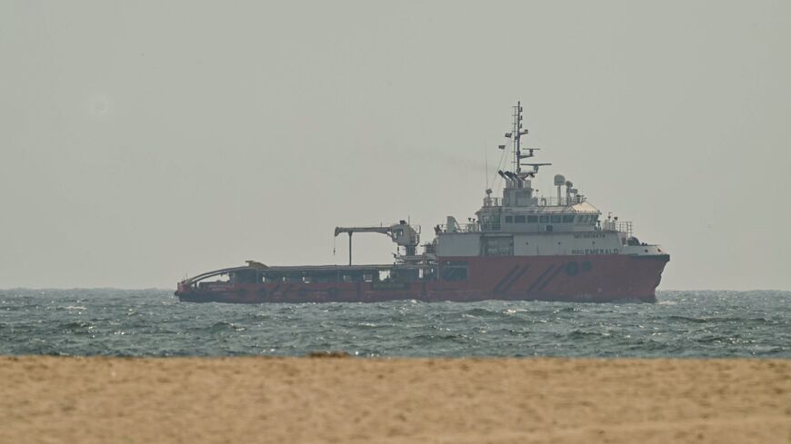 A ship sails off the coast of Ajman on July 10, 2026. 