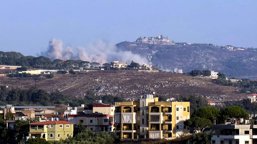 This photograph taken from the southern Lebanese city of Nabatieh shows smoke as it rises from the site of an Israeli-controlled explosion in the village of Kfar Tibnit, with the Beaufort citadel seen in the distance, July 13, 2026.