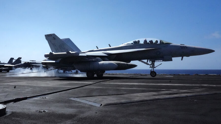 An EA-18G Growler assigned to Electric Attack Squadron (VAQ) 137 lands aboard the aircraft carrier USS Theodore Roosevelt (CVN-71) while the ship is moored in Honolulu, Hawaii, during Exercise RIMPAC (Rim of the Pacific) 2026 on July 17, 2026. 