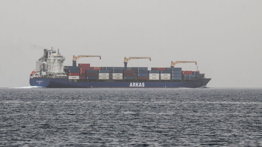 A commercial vessel passes through an international shipping lane off Yemen's Hanish Island in the Red Sea on July 27, 2026. 