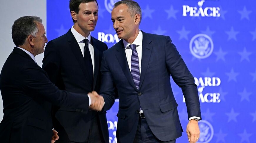 US Special Envoy Steve Witkoff (L) shakes hands with Nickolay Mladenov, Bulgarian High Representative for Gaza (R) next to US businessman Jared Kushner at the "Board of Peace" meeting during the World Economic Forum (WEF) annual meeting in Davos on January 22, 2026