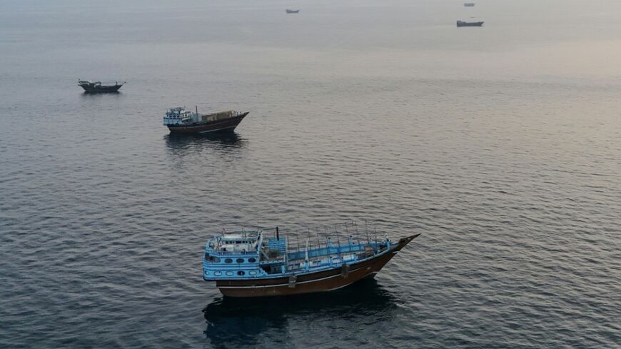 Boats anchored off the coast of northern Oman near the Strait of Hormuz. The waterway remains at the heart of the dispute between the US and Iran