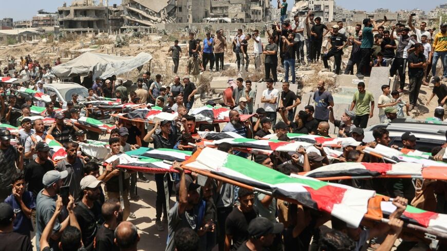 Palestinian mourners attend the funeral of members of the Abu Sharia and al-Hasayna families, whose remains were recently recovered from the rubble of the al-Sabra neighbourhoodstruck by Israeli bombardments in November 2023, in Gaza City on August 4, 2026