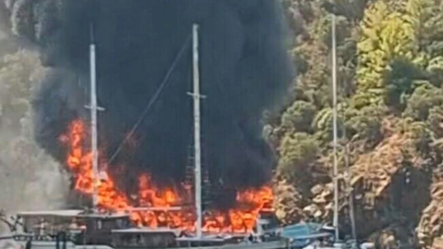 The children's tour boat in flames near the resort of Fethiye in southwestern Turkey