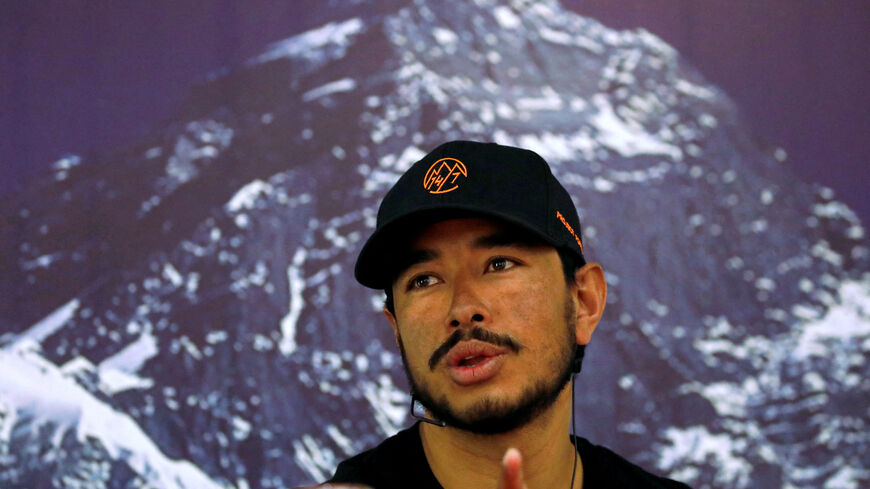 FILE PHOTO: Nirmal Purja speaks during a news conference after climbing six mountains including Mt. Everest in Kathmandu, Nepal May 28, 2019. REUTERS/Navesh Chitrakar/ File Photo