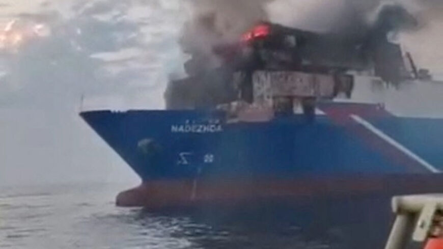 Smoke rises from a fire on the cargo ship Nadezhda after it was hit in a drone attack near Russia's Black Sea port of Novorossiysk, August 3, 2026 in this still image obtained from social media video. Social Media/via REUTERS