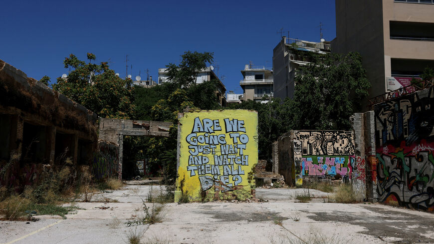 An abandoned building where the body of a British 38-year-old woman, Elisabeth Ross, was found in a suitcase on July 18th, in Athens, Greece, July 31, 2026. REUTERS/Louiza Vradi