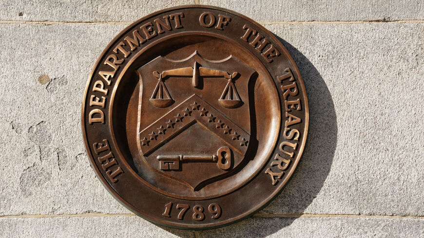 A bronze seal for the Department of the Treasury is shown at the U.S. Treasury building in Washington, U.S., January 20, 2023. REUTERS/Kevin Lamarque