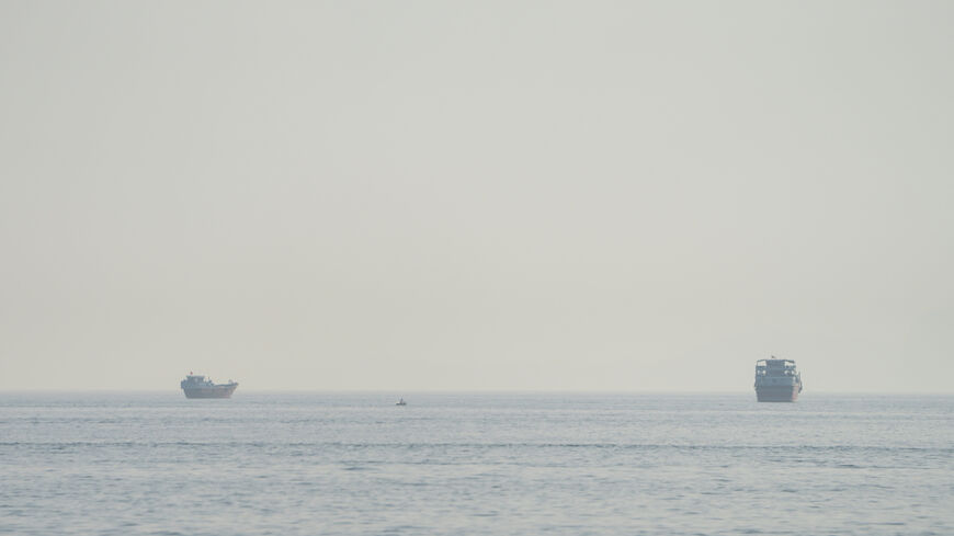 Vessels in the Strait of Hormuz, as seen from Musandam, Oman, July 31, 2026. REUTERS/Stringer