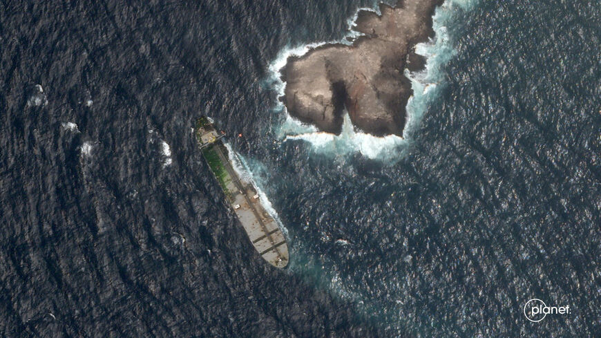 A satellite image shows the Caroline Bezengi, a sanctioned vessel, appeared to be covered in a coat of algae, off the coast of the Dhofar Governorate, Oman, July 19, 2026. 2026 Planet Labs PBC/Handout via REUTERS    THIS IMAGE HAS BEEN SUPPLIED BY A THIRD PARTY. MANDATORY CREDIT.