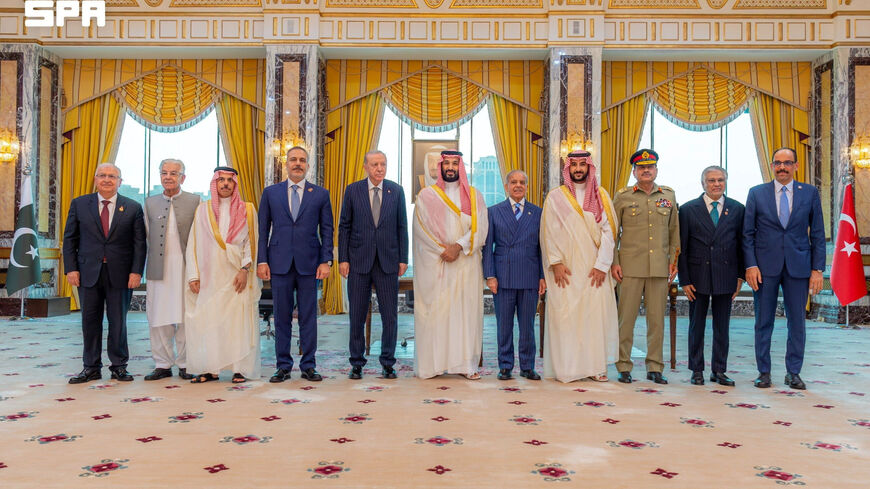 Turkish President Tayyip Erdogan, Saudi Crown Prince Mohammed bin Salman, and Pakistan's Prime Minister Shehbaz Sharif, accompanied by their ministers of Foreign Affairs and Defence, pose after signing a joint defence agreement in Mecca, Saudi Arabia, August 7, 2026. Saudi Press Agency/Handout via REUTERS ATTENTION EDITORS - THIS PICTURE WAS PROVIDED BY A THIRD PARTY.  WATERMARK FROM SOURCE