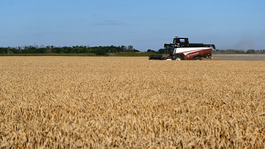 A combine harvests wheat in a field in the Rostov Region, Russia July 18, 2026. REUTERS/Sergey Pivovarov