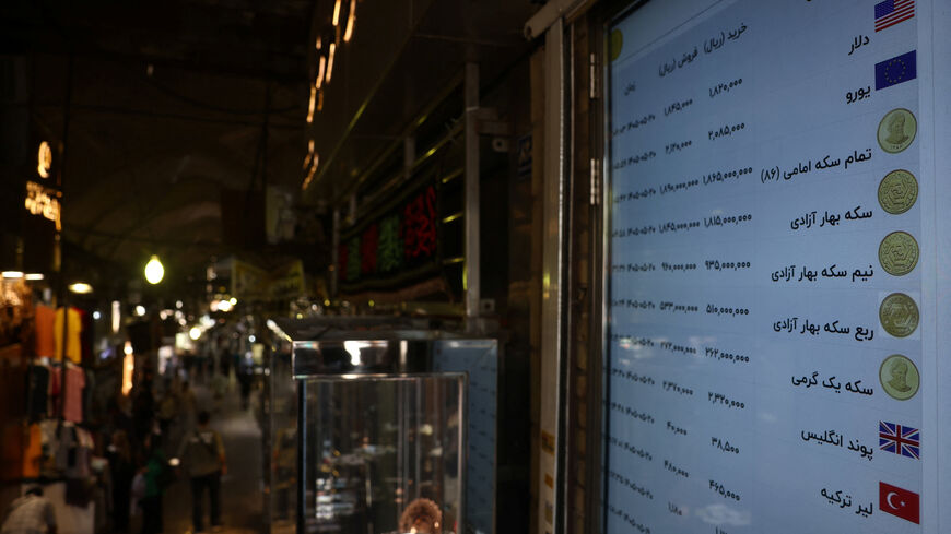 A display shows currency exchange information, in the Grand Bazaar in Tehran, Iran, August 11, 2026. Majid Asgaripour/WANA (West Asia News Agency) via REUTERS