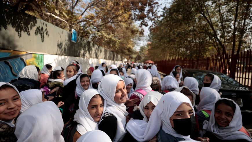 FILE PHOTO: Female primary school students leave school after a class in Kabul, Afghanistan, October 25, 2021. REUTERS/Zohra Bensemra/File Photo
