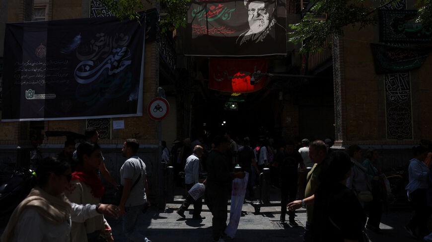 A banner depicting Iran's late Supreme Leader Ayatollah Ali Khamenei in the Grand Bazaar in Tehran, Iran, August 11, 2026. Majid Asgaripour/WANA (West Asia News Agency) via REUTERS