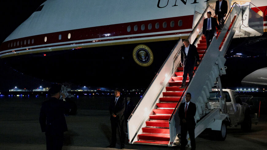 FILE PHOTO: U.S. President Donald Trump arrives aboard the new Qatari-gifted Air Force One, as he returns to Washington after participating in a NATO leaders' summit in Turkey, at Joint Base Andrews, Maryland, U.S., July 9, 2026. REUTERS/Jonathan Ernst/File Photo