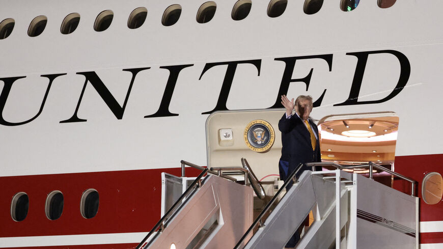 FILE PHOTO: U.S. President Donald Trump boards the new, Qatari-gifted Air Force One after arriving on one of the older planes operating as Air Force One, to return to Washington after his participation in a NATO leaders summit in Turkey, at RAF Mildenhall, in Suffolk, Britain, July 8, 2026. REUTERS/Jonathan Ernst/File Photo