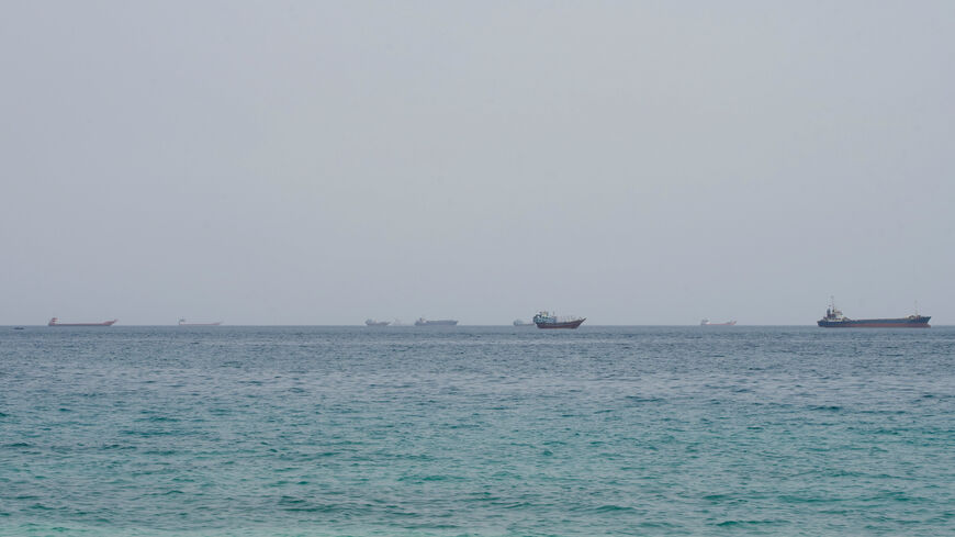 Vessels near the Strait of Hormuz, as seen from Musandam, Oman, August 10, 2026. REUTERS/Stringer