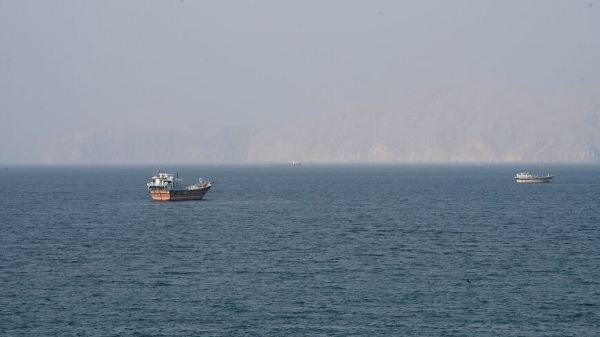 Vessels near the Strait of Hormuz, as seen from Musandam, Oman, August 17, 2026. REUTERS/Stringer